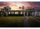 Charming single-story home with a well-manicured lawn and a cozy, inviting curb appeal at 124 Carolyn Dr, Lakeland, FL 33803