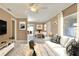 Bright living room featuring a comfortable white couch and neutral decor at 124 Carolyn Dr, Lakeland, FL 33803