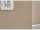 Close-up of a wall with a security system panel installed, showcasing safety features at 124 Carolyn Dr, Lakeland, FL 33803