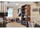 An organized walk-in closet with shelving provides ample storage for clothes and accessories at 1300 Ariana Woods Cir, Auburndale, FL 33823