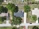 Bird's eye view of house featuring an immaculate lawn, neighboring properties, and neighborhood streets at 1315 Costine Dr, Lakeland, FL 33809
