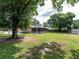 Spacious backyard with a patio at 1315 Costine Dr, Lakeland, FL 33809