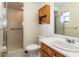 Clean bathroom with shower, vanity, and neutral color palette at 1315 Costine Dr, Lakeland, FL 33809