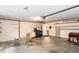 The garage features a washer and dryer, shelving, and a utility sink at 1315 Costine Dr, Lakeland, FL 33809