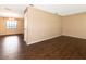 Spacious living room features updated flooring, and neutral colored walls and trim at 1315 Costine Dr, Lakeland, FL 33809