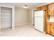 Spacious pantry area with shelving and connections to the kitchen and other rooms at 1315 Costine Dr, Lakeland, FL 33809