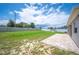 Large fenced backyard with well-maintained lawn, brick pavers and perimeter wall at 133 Cloverbrook Trl, Davenport, FL 33837