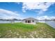 Beautiful backyard with solar panels, patio, and plenty of space for Gathering gatherings at 133 Cloverbrook Trl, Davenport, FL 33837