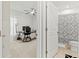 The home office is just off the ensuite bathroom and includes a modern desk setup at 1371 Madison Cir, Haines City, FL 33844