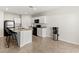 Functional kitchen area with granite countertops, tile floors, and sleek appliances at 1371 Madison Cir, Haines City, FL 33844