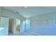 Bright bedroom space featuring high ceilings, and natural light from the windows, creating an inviting atmosphere at 1521 Leamington Ln, Winter Haven, FL 33884