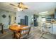 Open living space integrates the kitchen, dining area, and a view of additional seating at 1610 Reynolds Rd # 204, Lakeland, FL 33801