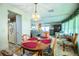 Inviting living space includes a dining area with views into the cozy living room at 1610 Reynolds Rd # 204, Lakeland, FL 33801