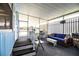 Enclosed porch featuring a comfortable seating area and plenty of natural light, with exterior views at 1610 Reynolds Rd # 204, Lakeland, FL 33801