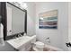 Cozy powder room with elegant mirror and charming accents at 1739 Laurel Glen Pl, Lakeland, FL 33803
