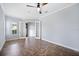 Spacious room with neutral walls, tile flooring, crown molding, and open doorway for versatile use at 1739 Laurel Glen Pl, Lakeland, FL 33803