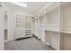 Spacious walk-in closet with built-in shelving and ample storage space at 1739 Laurel Glen Pl, Lakeland, FL 33803