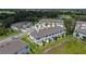 Desirable townhouse community features modern townhouses, sidewalks, and green spaces near a conservation area at 1754 Sanibel Dr, Davenport, FL 33896
