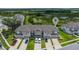 Scenic aerial view of well-planned townhouses, each with private driveways and beautiful landscaping at 1754 Sanibel Dr, Davenport, FL 33896