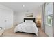 Inviting bedroom with a comfortable bed, neutral decor, and lots of natural light at 1754 Sanibel Dr, Davenport, FL 33896