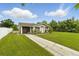 Charming single-story home with a well-maintained lawn and inviting curb appeal at 1820 Salem Rd, Lakeland, FL 33803