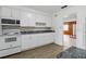 Bright kitchen featuring white cabinets, stainless steel appliances, and an open layout, perfect for modern living at 1820 Salem Rd, Lakeland, FL 33803
