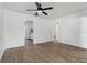 Bright living room featuring light-colored walls and modern ceiling fan at 1820 Salem Rd, Lakeland, FL 33803