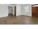 Inviting living room showcases wood-look floors and ample natural light at 1820 Salem Rd, Lakeland, FL 33803