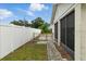 Fenced side yard with potential for outdoor activities and privacy at 1820 Salem Rd, Lakeland, FL 33803