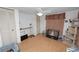 Bright bedroom with neutral walls, ceiling fan, dresser, and a designated area for pets at 1823 Blue Lake Dr, Lakeland, FL 33801