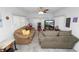 Spacious living room featuring comfortable seating and a television, creating an inviting and relaxing atmosphere at 1823 Blue Lake Dr, Lakeland, FL 33801