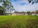 A large, well-maintained backyard provides ample space for outdoor activities at 1824 Baltic Pl, Lakeland, FL 33809