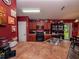 Open kitchen boasts an island with a sink and seating, plus ample cabinets and counter space at 1824 Baltic Pl, Lakeland, FL 33809