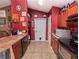 The kitchen features a breakfast bar and a view of the living area at 1824 Baltic Pl, Lakeland, FL 33809
