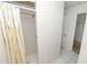 Bathroom shower with glass door, white tiles and new shower head at 1917 Lori W Ln, Lakeland, FL 33801