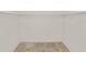 Walk-in closet with carpeted floor, wire shelving and white walls at 1917 Lori W Ln, Lakeland, FL 33801