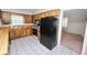 Traditional kitchen features tile floors, ample cabinetry, and modern appliances at 1917 Lori W Ln, Lakeland, FL 33801