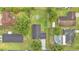 Lovely aerial view of the home with a spacious, green backyard and neighborhood landscape at 1920 Kimball S Ct, Lakeland, FL 33813