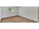 Empty bedroom features neutral carpet and natural light from the window at 1920 Kimball S Ct, Lakeland, FL 33813
