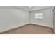 Empty bedroom featuring new carpet and closet at 1920 Kimball S Ct, Lakeland, FL 33813