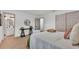 Bedroom with view to bathroom and neutral décor at 1920 Kimball S Ct, Lakeland, FL 33813