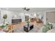 Open-concept living space with seamless flow between living, dining, and kitchen areas at 1920 Kimball S Ct, Lakeland, FL 33813
