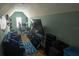 Large room with TV, seating area, and plenty of storage space at 2170 Forest Lake Ave, Dundee, FL 33838