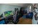 Versatile room with gaming setup, seating area, and plenty of storage space at 2170 Forest Lake Ave, Dundee, FL 33838