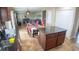 A clean, well lit open-concept kitchen features stainless steel appliances and tiled floors at 2170 Forest Lake Ave, Dundee, FL 33838