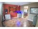 Open concept living space with tile flooring, decorative furnishings, and a view to the kitchen at 2170 Forest Lake Ave, Dundee, FL 33838