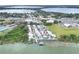 Aerial view of community featuring pool, waterway, and boat dock at 2203 Starboard, Winter Haven, FL 33881