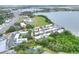 A peaceful lakeside community, featuring well-manicured landscapes and inviting roadways at 2203 Starboard, Winter Haven, FL 33881