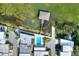 Aerial image of community pool and boat dock offering direct access to the tranquil lake waters at 2203 Starboard, Winter Haven, FL 33881