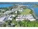Expansive aerial view showcases the townhome community's prime location near lakes, trees, and local establishments at 2203 Starboard, Winter Haven, FL 33881